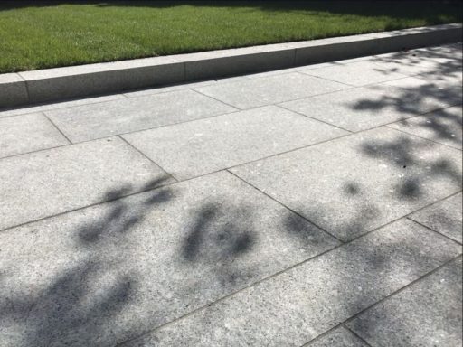 Natural granite flagged patio in Grassendal, Liverpool