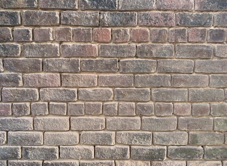 Brickwork raked out ready for lime pointing in Grassendale, Liverpool
