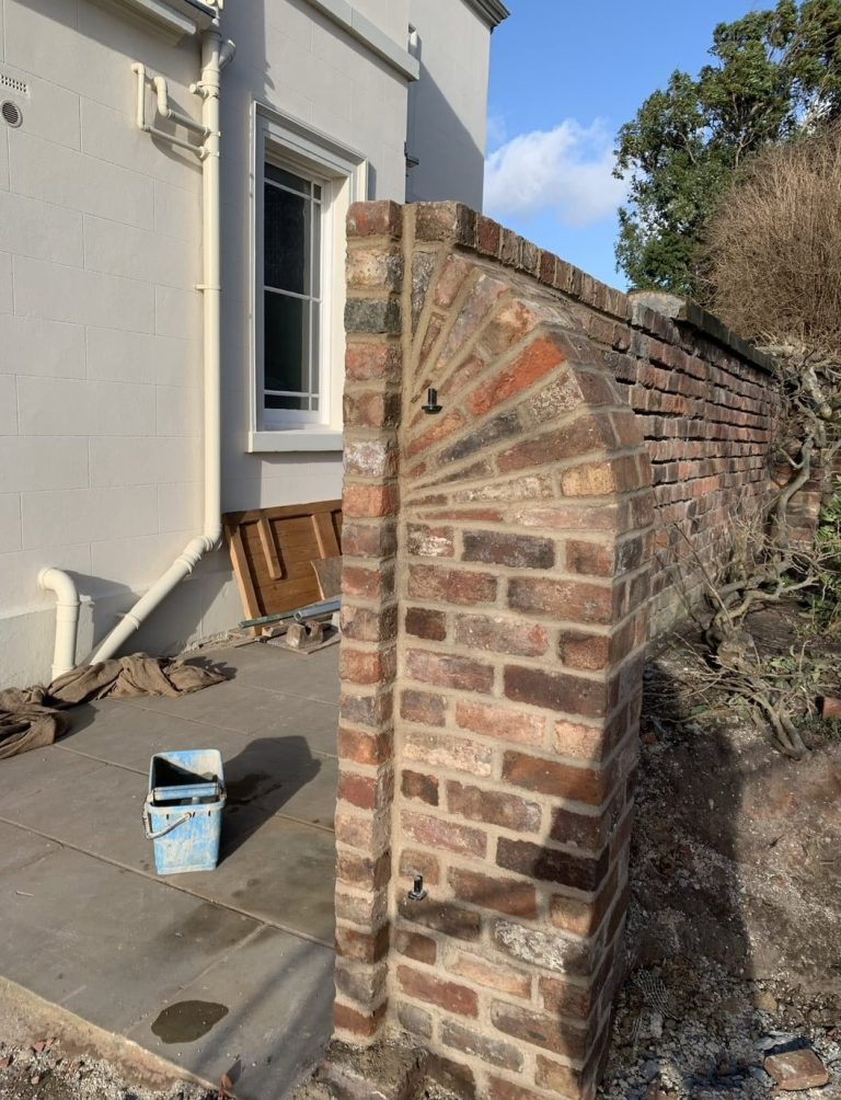 Brick pier built with lime mortar in Grassendale, Liverpool